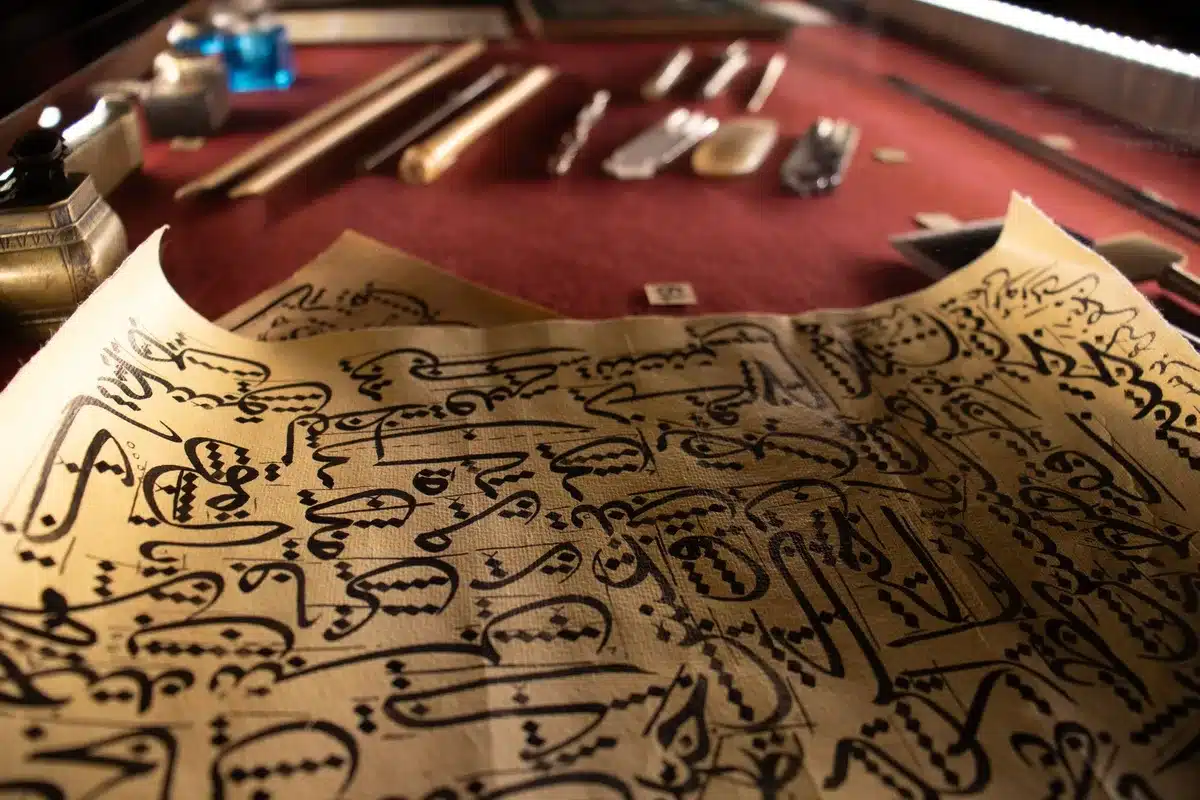 Ancient manuscript with mysterious symbols illuminated on a desk in shadowy light