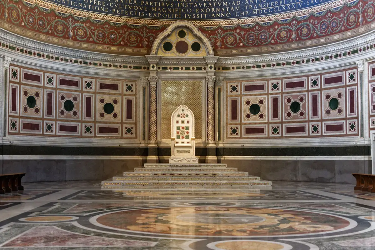 Elegant empty throne room with ornate furnishings and soft light, symbolizing the absence of a character
