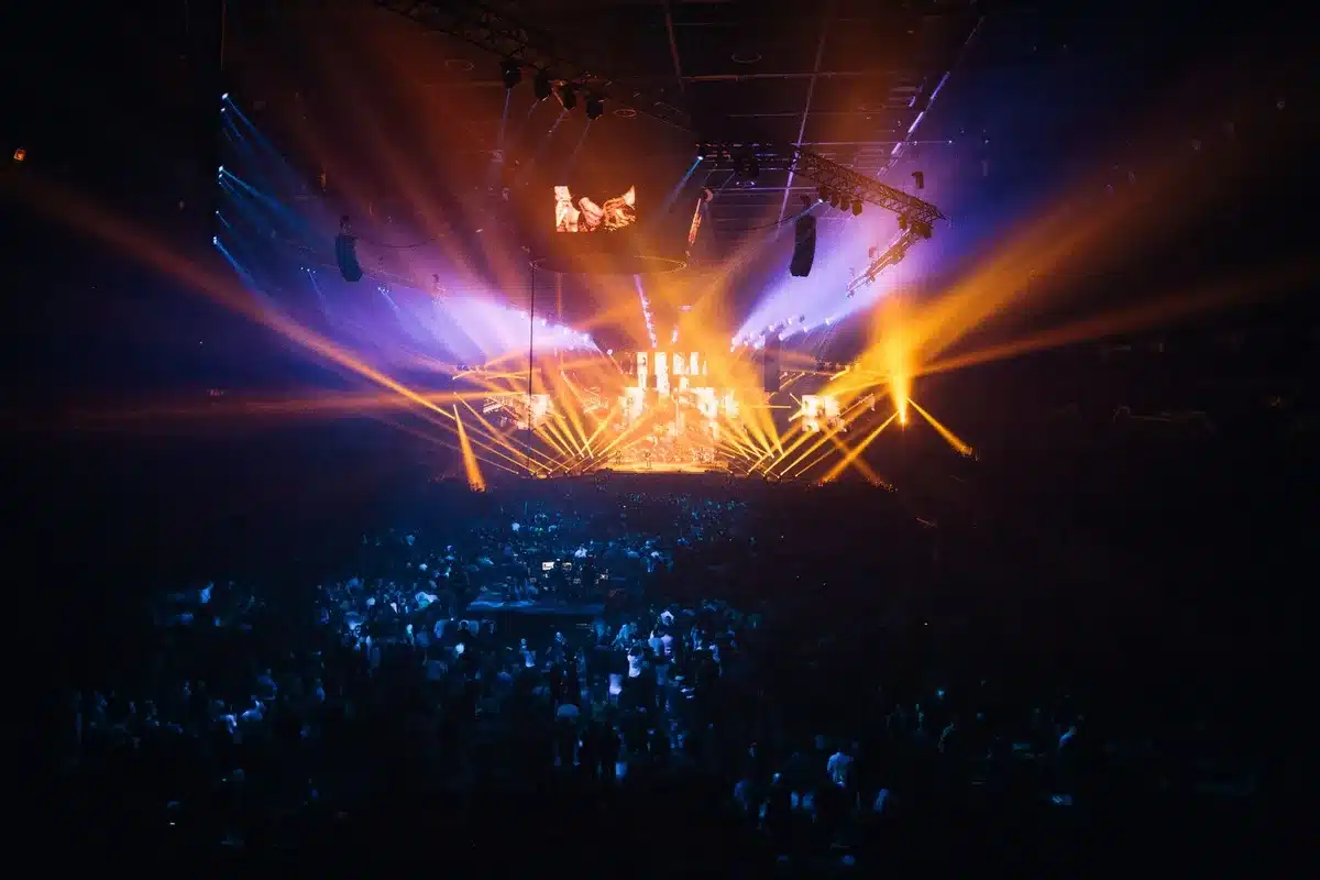 Large arena venue with stage setup and seating for concert performances