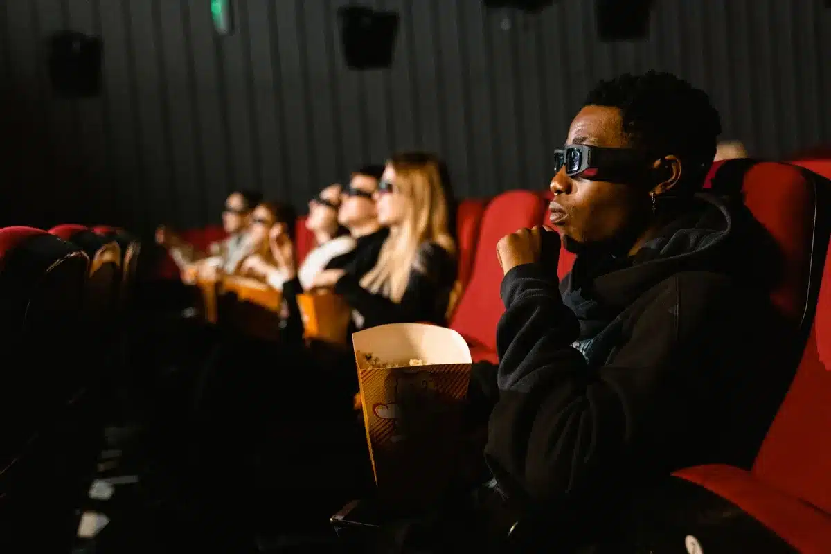 Montage of diverse cinema screens showing animated films to global audiences