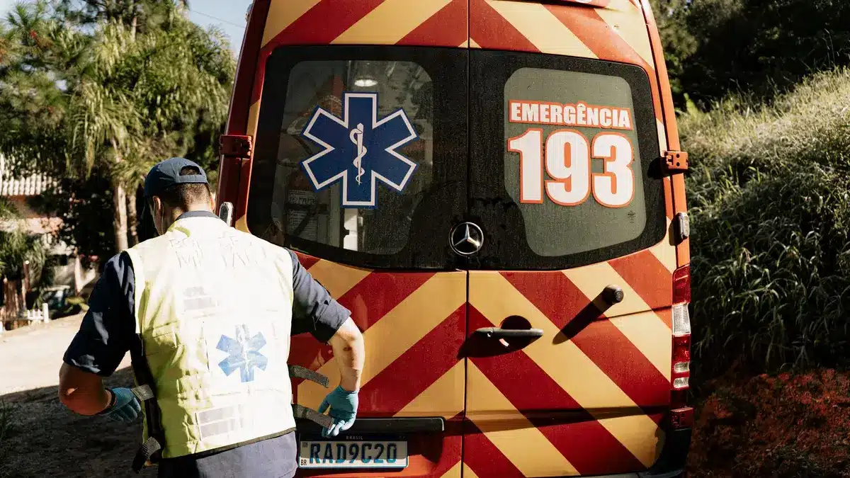 Emergency responders at the scene of a two-car collision on a city street
