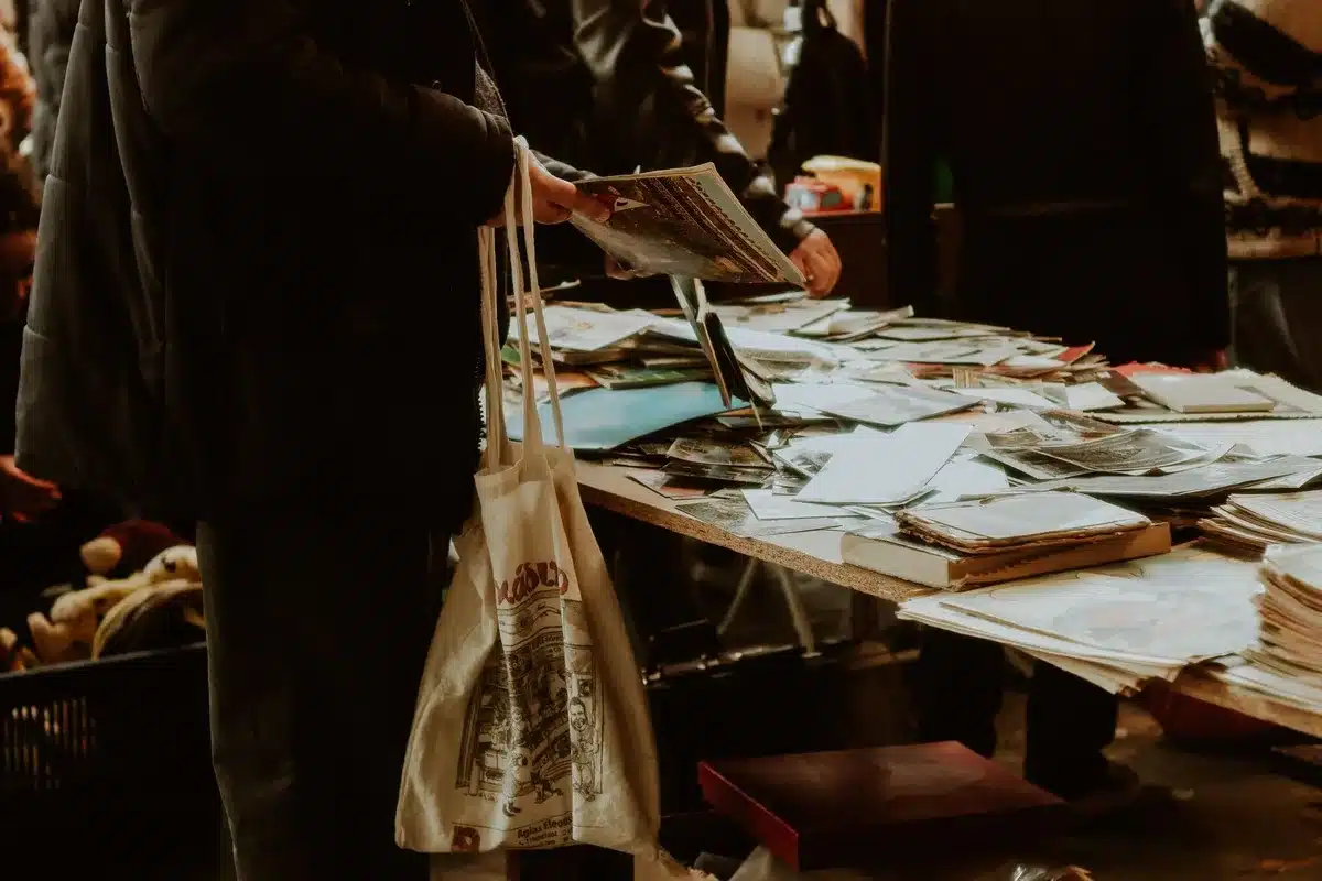 Film industry professionals negotiating deals at a festival marketplace setting