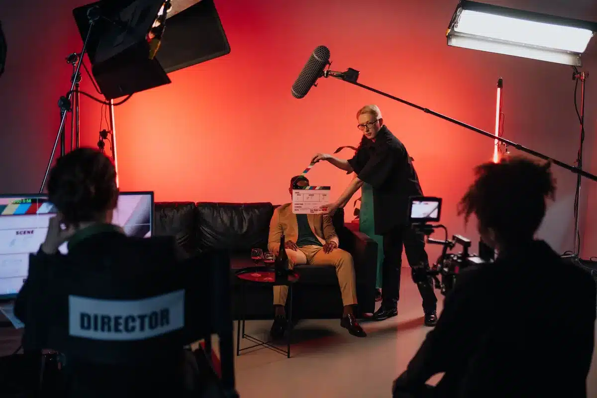 Director working with camera crew on a professional film set