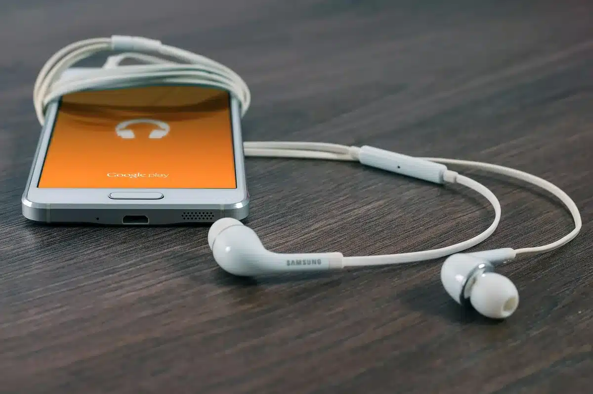 Hand holding smartphone showing streaming subscription price increase notification on screen