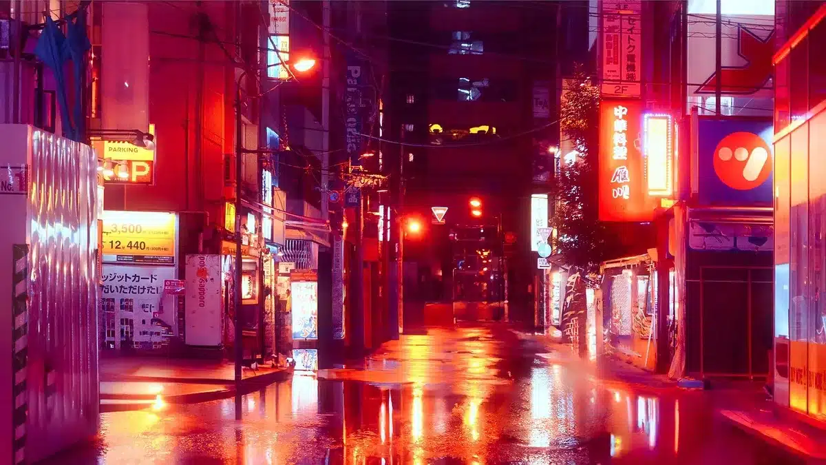 Neon-lit Tokyo street with a pizza shop sign suggesting the series' new setting