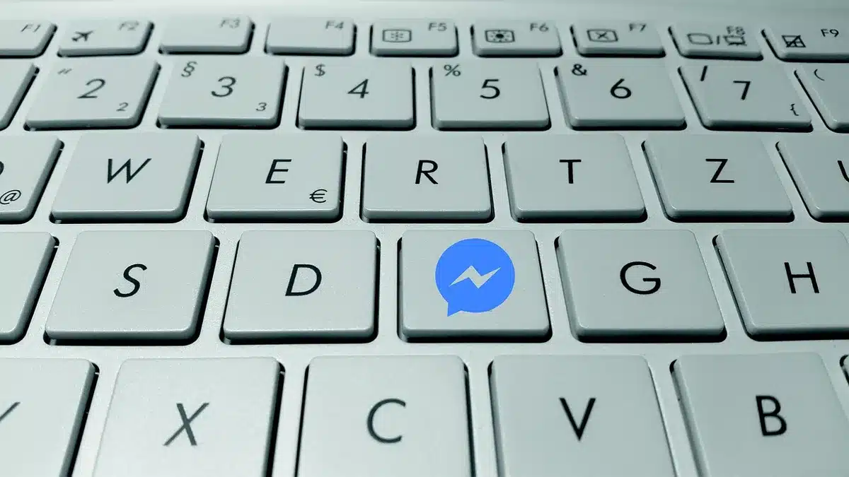 Close-up of a phone showing a social media message in a feed