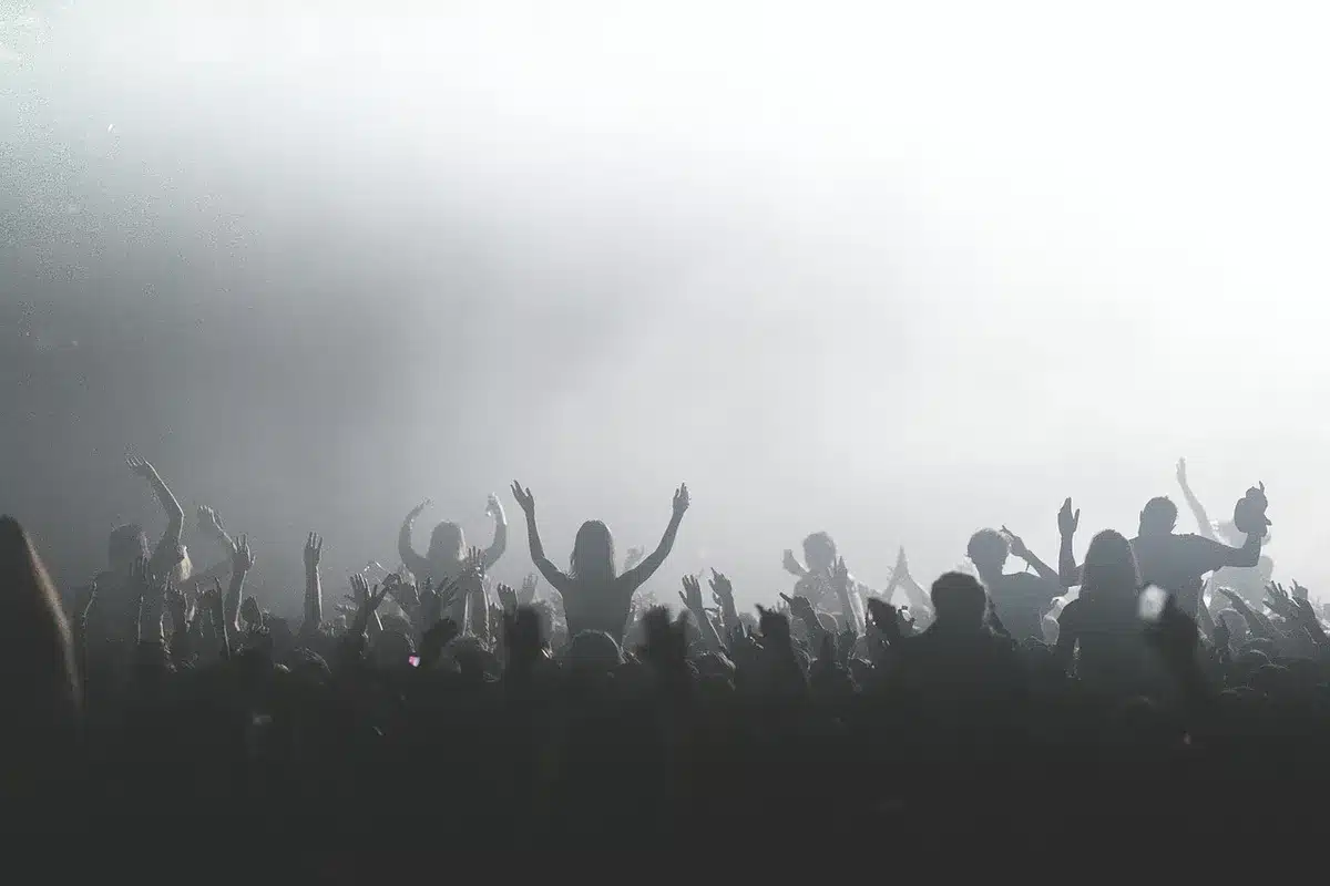 Mixed venues: outdoor festival stage and intimate theater crowd