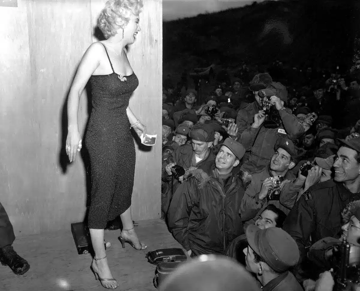 Actress with an awards statue evoking film and TV accolades