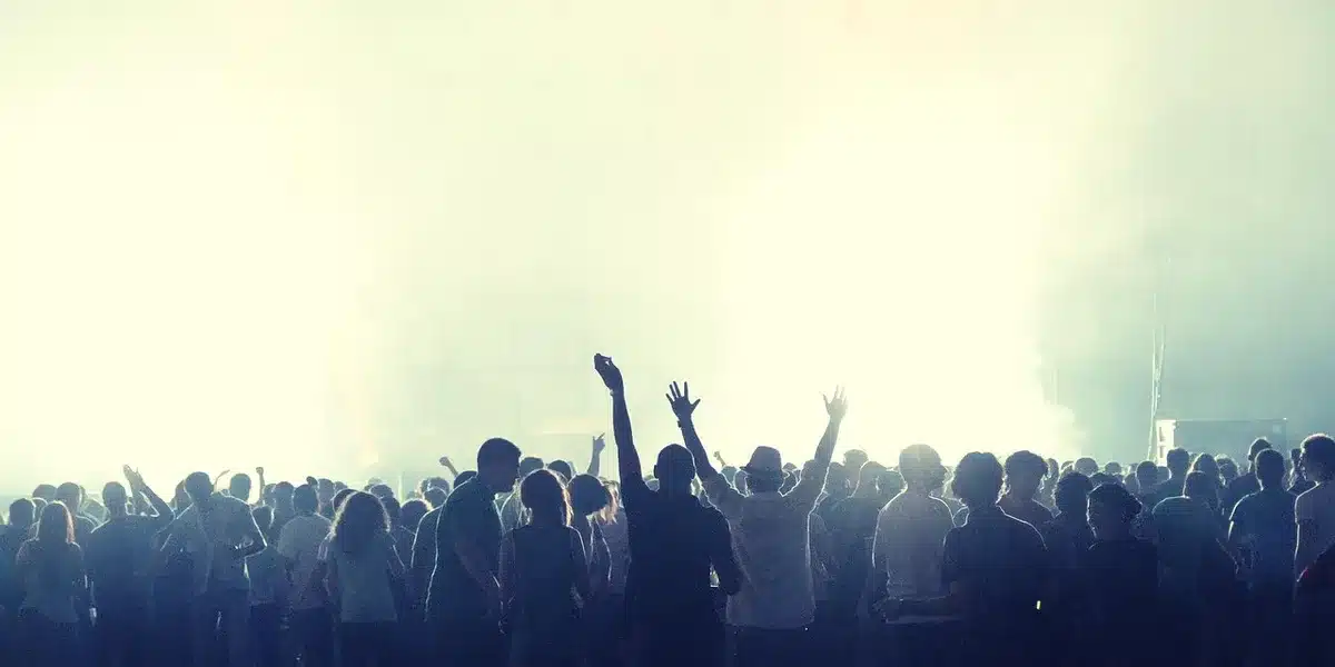 Festival stage and crowd at outdoor rock festival