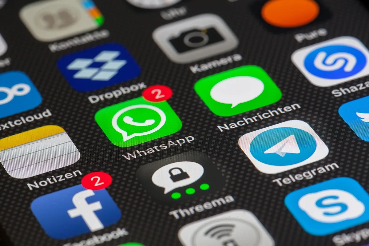 Actors sharing tributes on social media screens and mobile devices