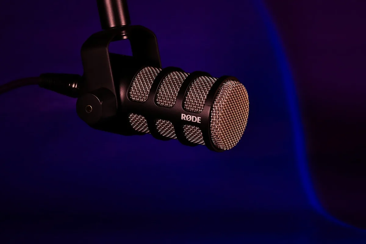 Microphone and headphones in a podcast studio representing a shared interview clip