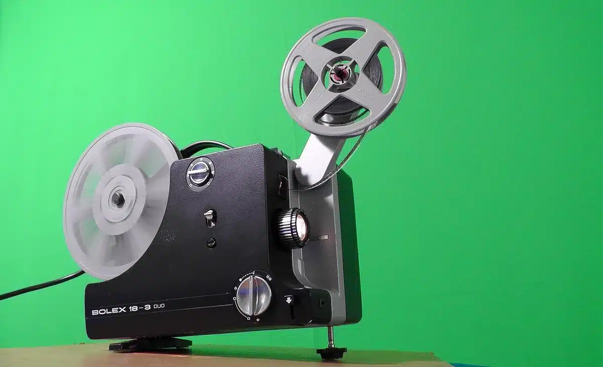 Projection screen showing blurred film frames in an editing suite