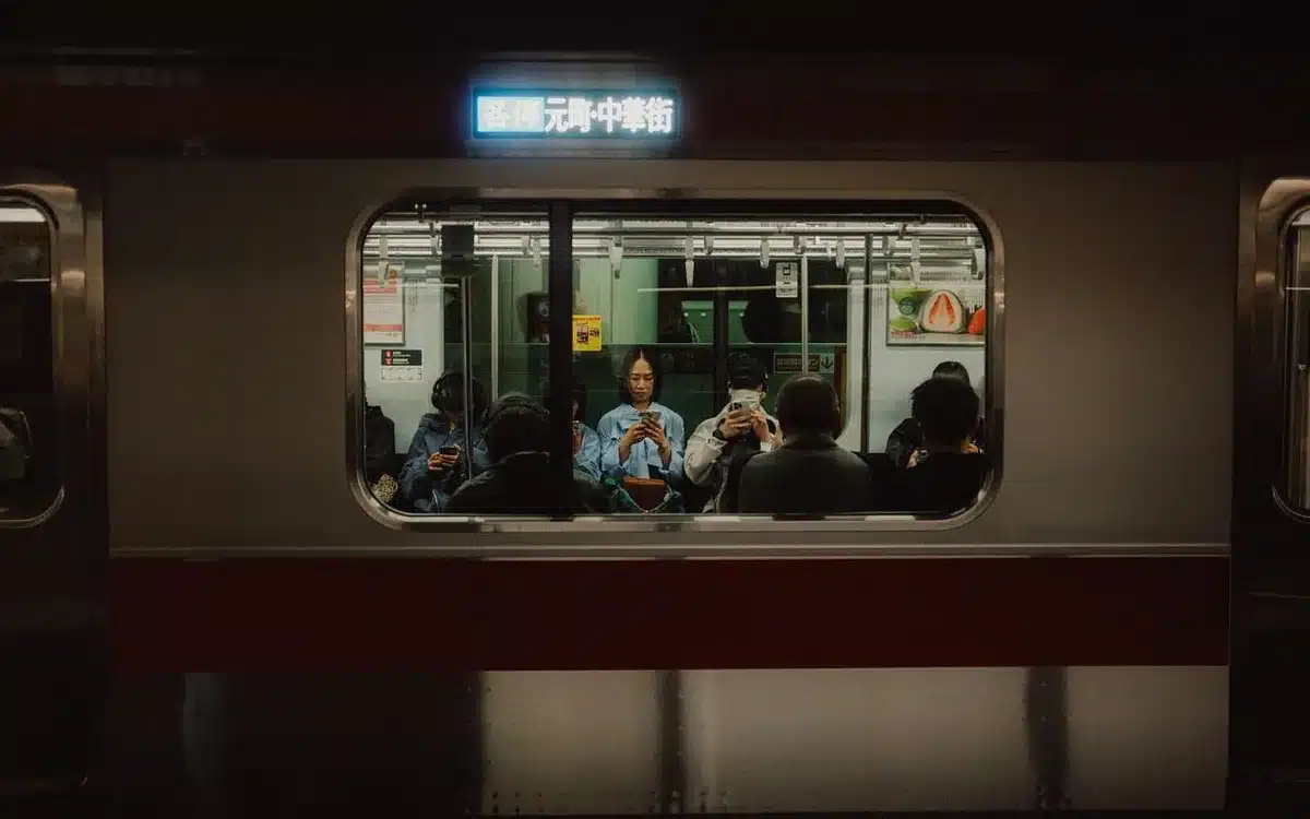 Director and crew filming a music video in a Tokyo convenience store