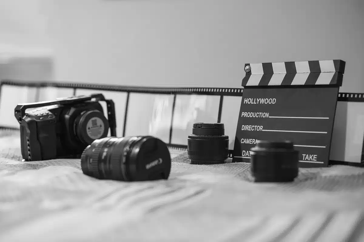 Director and camera operator framing a candid scene on set