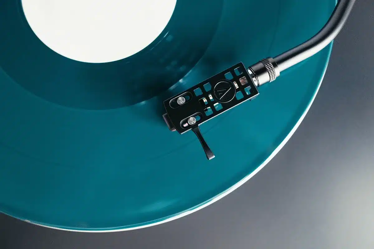 Close-up of an album tracklist and singles listing for Watch Dis